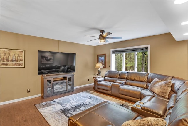 2847 National Pike, Wharton Twp, PA 15421 - living area with ceiling fan, baseboards, wood finished floors, and a glass covered fireplace