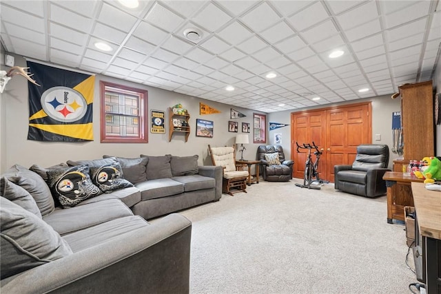carpeted living area featuring recessed lighting