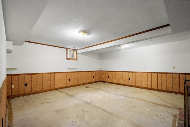 297 Alamae Lakes Rd, South Franklin, PA 15301 - finished below grade area with a wainscoted wall, wood walls, and a textured ceiling
