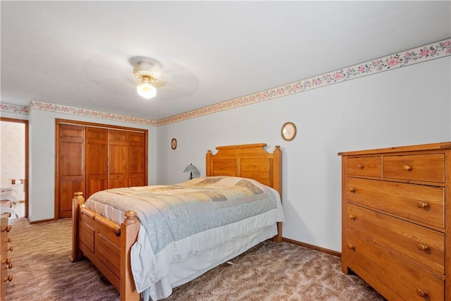 297 Alamae Lakes Rd, South Franklin, PA 15301 - bedroom featuring a closet, carpet flooring, a ceiling fan, and baseboards