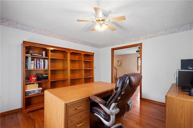 297 Alamae Lakes Rd, South Franklin, PA 15301 - office space with baseboards, a ceiling fan, and wood finished floors