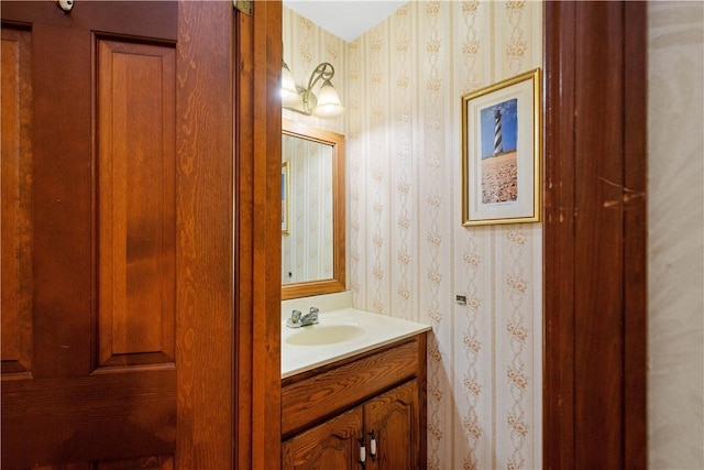 297 Alamae Lakes Rd, South Franklin, PA 15301 - bathroom featuring wallpapered walls and vanity
