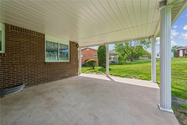 view of patio / terrace featuring a carport