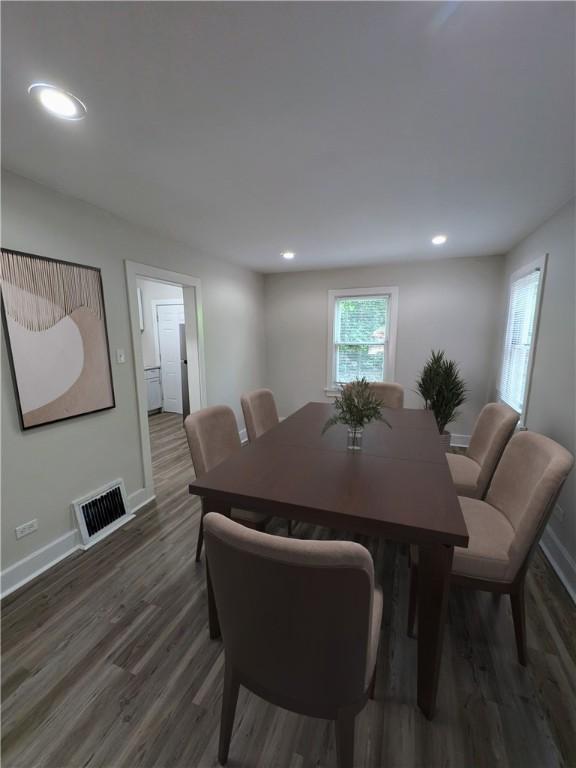 1216 Morrow St, Wilkinsburg, PA 15221 - dining space with wood finished floors, baseboards, and recessed lighting