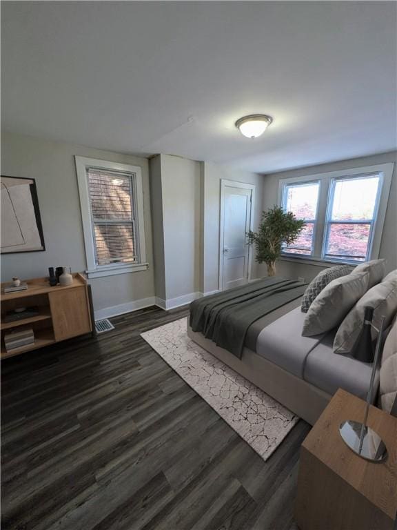 1216 Morrow St, Wilkinsburg, PA 15221 - bedroom featuring dark wood-style flooring and baseboards