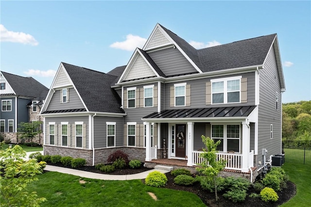 521 Cambridge Ct, Pine Twp Nal, PA 15090 - view of front of house featuring a porch, a standing seam roof, stone siding, metal roof, and cooling unit