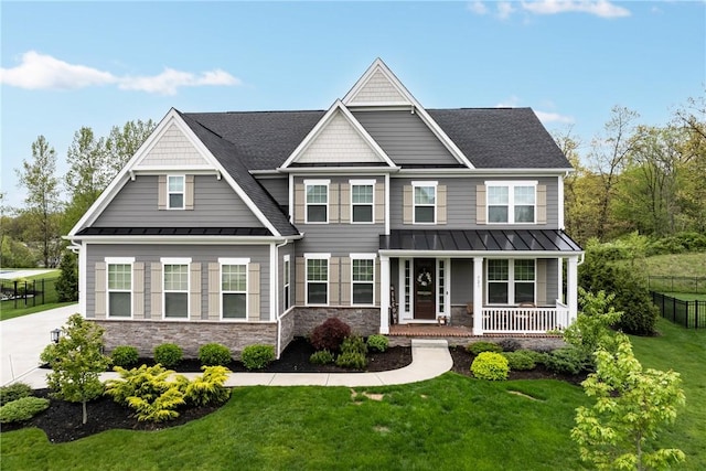 521 Cambridge Ct, Pine Twp Nal, PA 15090 - craftsman-style home featuring a standing seam roof, a porch, stone siding, and a shingled roof