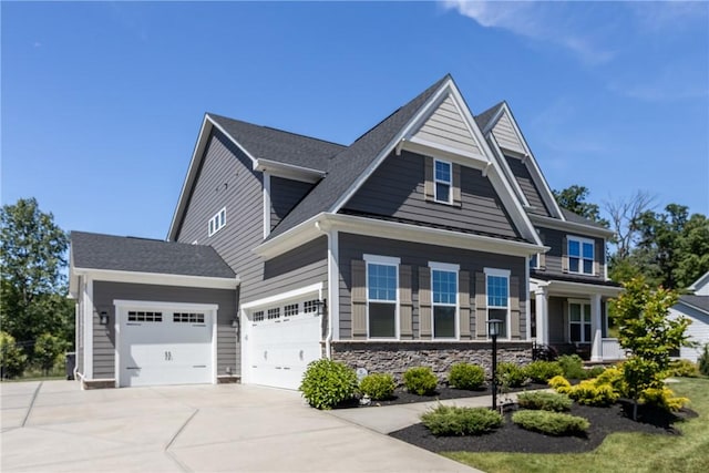 521 Cambridge Ct, Pine Twp Nal, PA 15090 - craftsman inspired home with driveway, a garage, and stone siding
