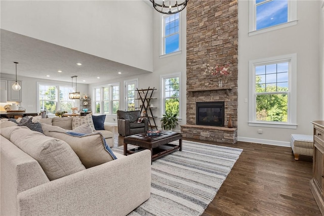 521 Cambridge Ct, Pine Twp Nal, PA 15090 - living area with a towering ceiling, plenty of natural light, dark wood finished floors, baseboards, and a chandelier