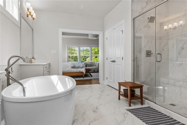 521 Cambridge Ct, Pine Twp Nal, PA 15090 - ensuite bathroom featuring a marble finish shower, marble look tile flooring, a soaking tub, and vanity