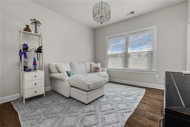 521 Cambridge Ct, Pine Twp Nal, PA 15090 - living area with baseboards, dark wood-style flooring, and a chandelier