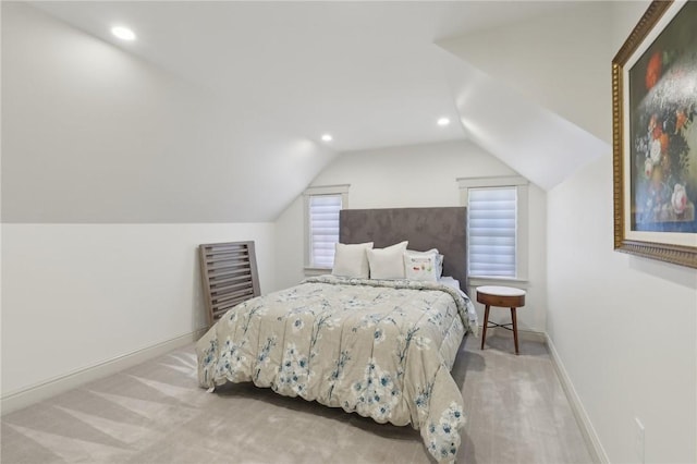 carpeted bedroom featuring vaulted ceiling, recessed lighting, and baseboards