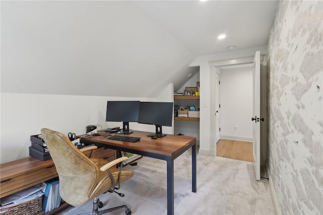 home office with light carpet, lofted ceiling, and recessed lighting