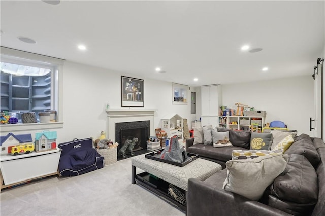 carpeted living room featuring recessed lighting and a fireplace with flush hearth