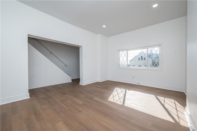 61 Greenbush St, Mt Washington, PA 15211 - unfurnished room featuring wood finished floors, stairway, and recessed lighting