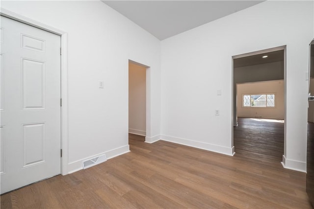 61 Greenbush St, Mt Washington, PA 15211 - empty room with wood finished floors and baseboards