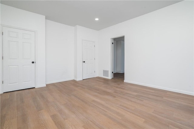 61 Greenbush St, Mt Washington, PA 15211 - empty room with light wood-style flooring and recessed lighting