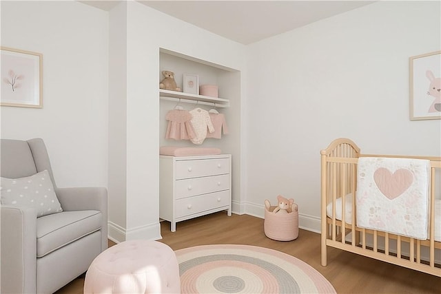 61 Greenbush St, Mt Washington, PA 15211 - bedroom with wood finished floors and a crib