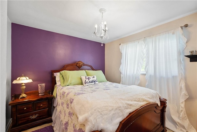 bedroom with a chandelier