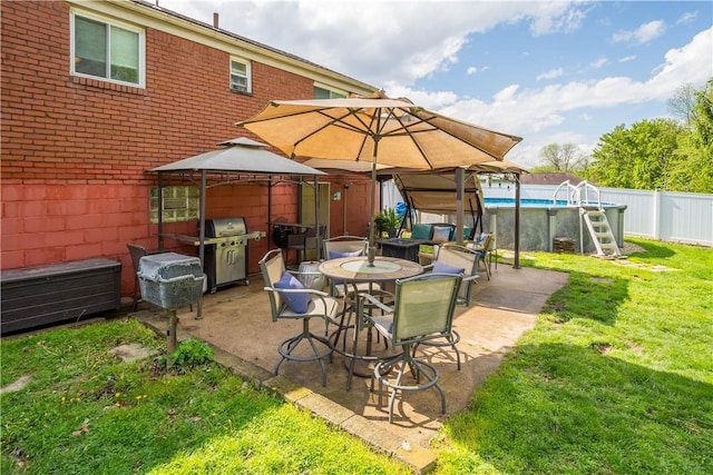 view of patio with a gazebo and a grill