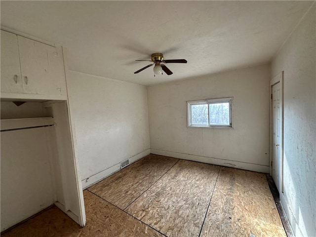 unfurnished bedroom with ceiling fan
