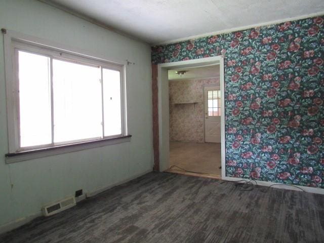 428 Grindstone Rd, Jefferson Twp Fay, PA 15442 - unfurnished bedroom with wallpapered walls, baseboards, and wood finished floors