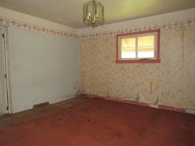 428 Grindstone Rd, Jefferson Twp Fay, PA 15442 - unfurnished room with a chandelier and baseboards