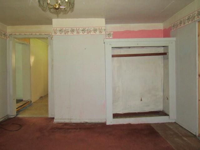 428 Grindstone Rd, Jefferson Twp Fay, PA 15442 - unfurnished bedroom with a chandelier