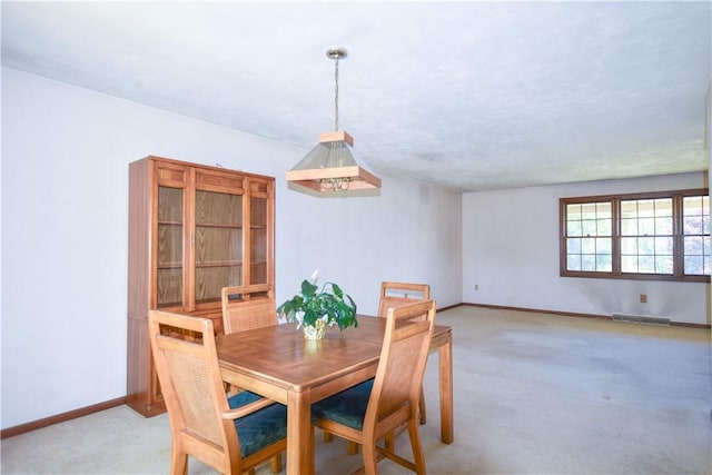 105 Audrey Ln, Jefferson Twp But, PA 16023 - dining room featuring light carpet and baseboards