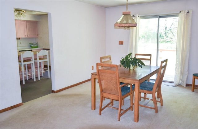 105 Audrey Ln, Jefferson Twp But, PA 16023 - dining room featuring light carpet and baseboards