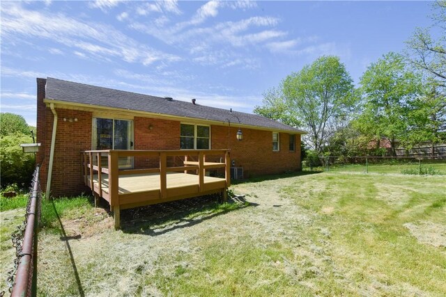 105 Audrey Ln, Jefferson Twp But, PA 16023 - back of property with a deck, brick siding, and roof with shingles