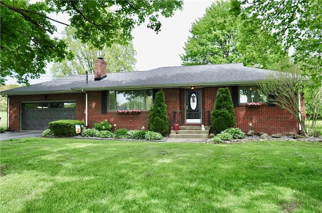 3344 Orangeville Rd, South Pymatuning Twp, PA 16150 - ranch-style home with brick siding, an attached garage, a front lawn, a chimney, and asphalt driveway