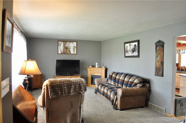 3344 Orangeville Rd, South Pymatuning Twp, PA 16150 - carpeted living room featuring a fireplace and baseboards