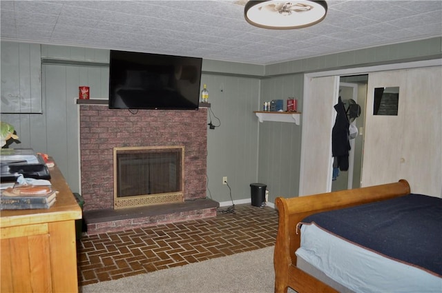 3344 Orangeville Rd, South Pymatuning Twp, PA 16150 - bedroom with brick patterned flooring, a fireplace, baseboards, and a closet