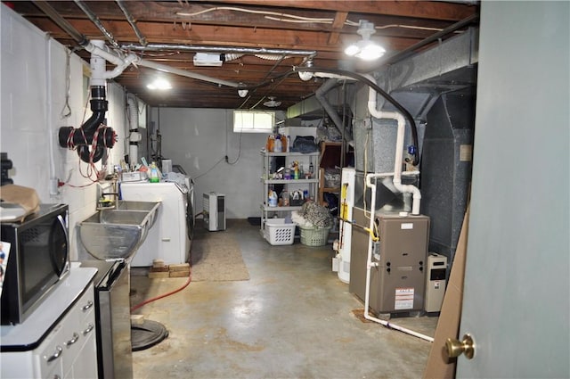 3344 Orangeville Rd, South Pymatuning Twp, PA 16150 - basement featuring washing machine and dryer and heating unit