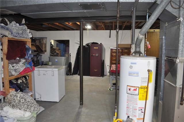 3344 Orangeville Rd, South Pymatuning Twp, PA 16150 - unfinished below grade area featuring gas water heater and fridge