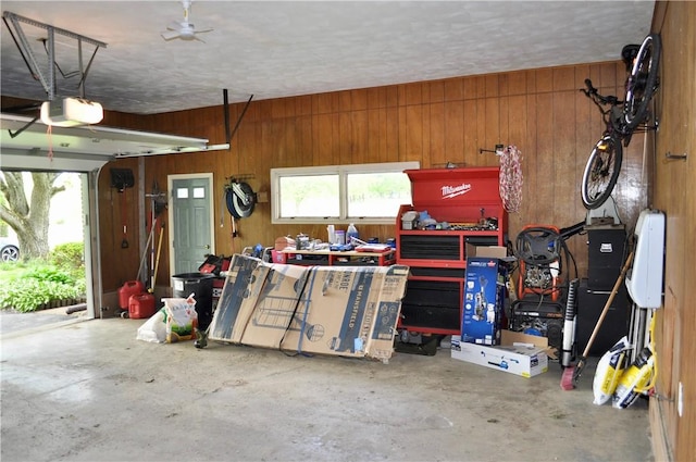 3344 Orangeville Rd, South Pymatuning Twp, PA 16150 - garage featuring wooden walls and a garage door opener