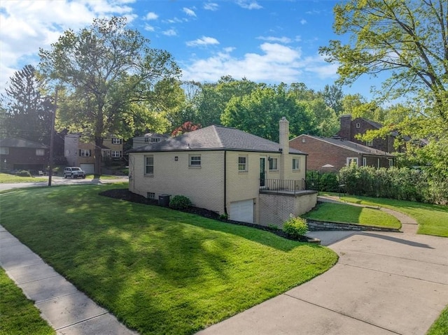 417 Orchard Dr, Mt Lebanon, PA 15228 - view of property exterior with an attached garage, a yard, brick siding, a residential view, and a chimney