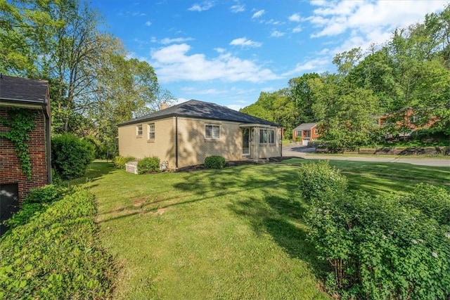 417 Orchard Dr, Mt Lebanon, PA 15228 - view of side of property with a yard, brick siding, and a chimney