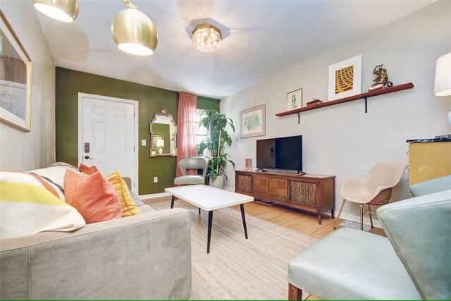 185 42nd St, Lawrenceville, PA 15201 - living room featuring wood finished floors and baseboards
