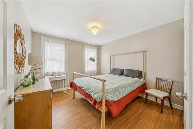 185 42nd St, Lawrenceville, PA 15201 - bedroom featuring light wood finished floors and baseboards