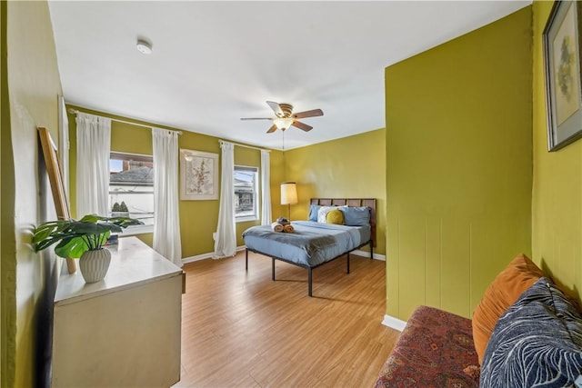 1851/2 42nd St, Lawrenceville, PA 15201 - bedroom with light wood finished floors, baseboards, and ceiling fan
