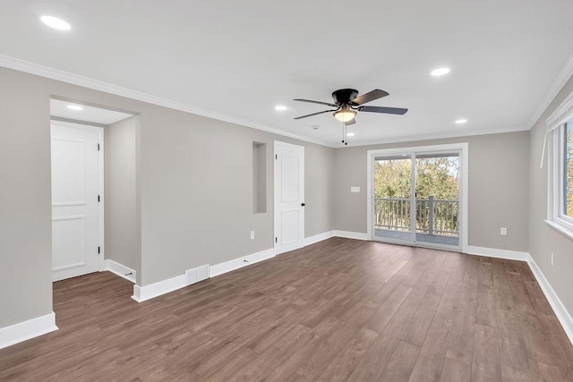 unfurnished room featuring dark wood-style floors, ceiling fan, baseboards, recessed lighting, and crown molding