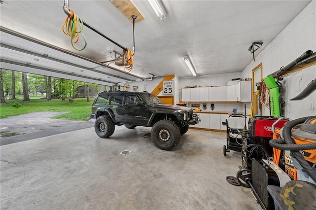 garage featuring a garage door opener