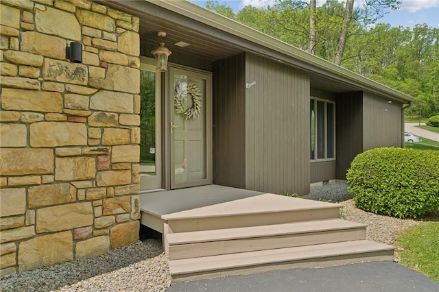 view of exterior entry with stone siding