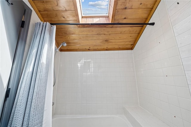 full bath featuring shower / tub combo with curtain