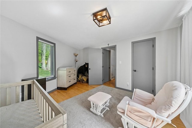 bedroom featuring light wood finished floors
