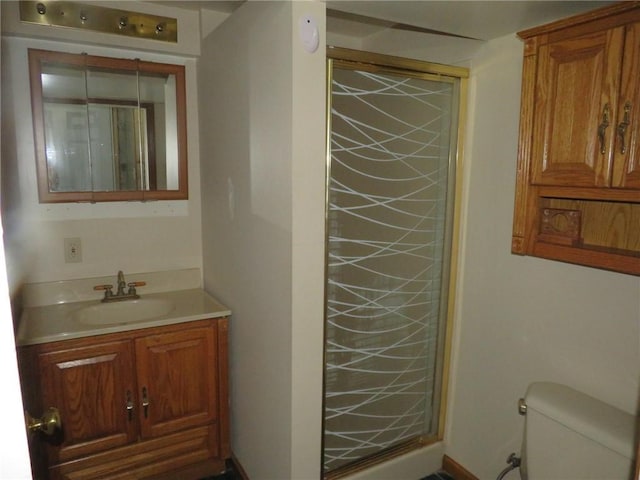 973 Glen Hayes Dr, Moon/Crescent Twp, PA 15046 - bathroom featuring a stall shower, toilet, and vanity