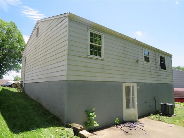 973 Glen Hayes Dr, Moon/Crescent Twp, PA 15046 - back of property featuring central air condition unit and a patio