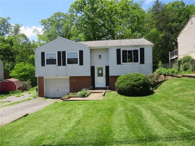 973 Glen Hayes Dr, Moon/Crescent Twp, PA 15046 - raised ranch with brick siding, driveway, and an attached garage